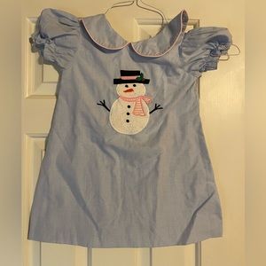 Light blue gingham dress with snowman appliqué.